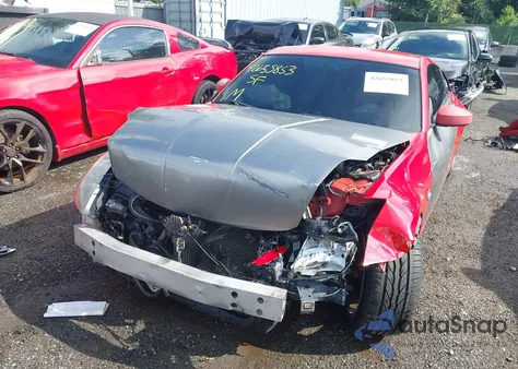 2003 Nissan 350Z Touring z USA, uszkodzony, nr VIN JN1AZ34E23T013078